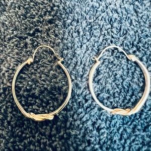 Steeling silver hoop earrings 15/16” diameter with love knot design at bottom